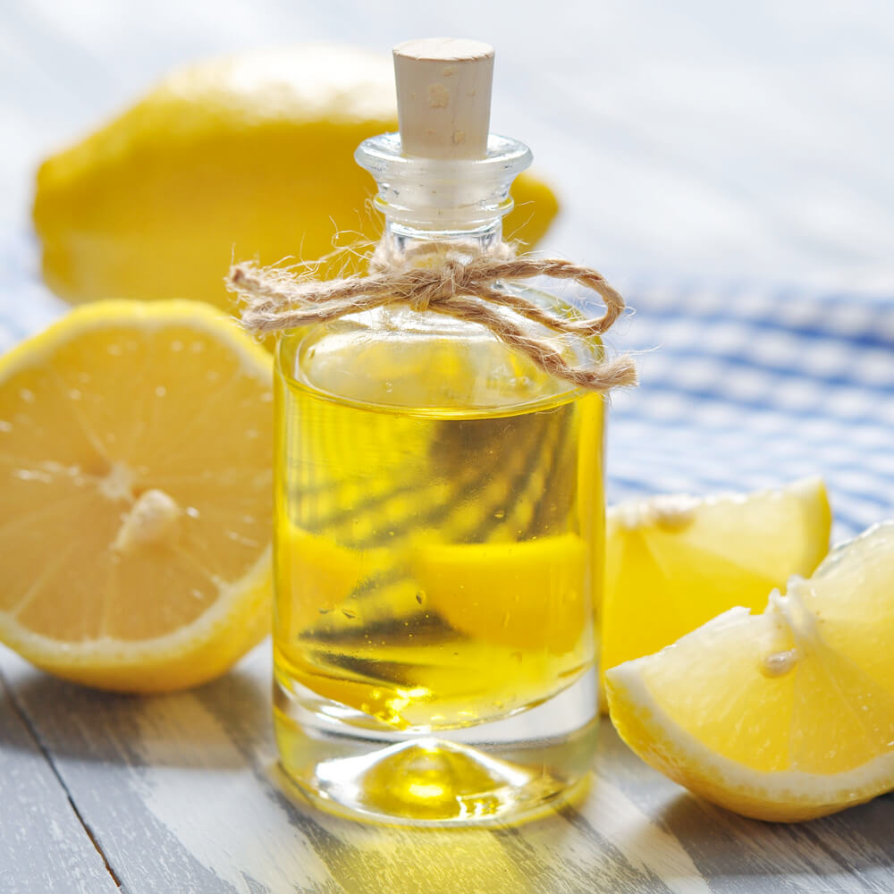 A bottle of lemon essential oil, capturing the bright and uplifting essence of citrus.